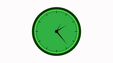 Green analog clock with black hands and markings on a white background time.. Stock Footage 337566947