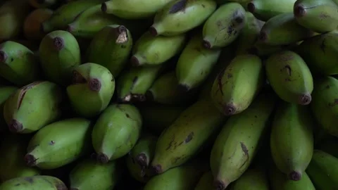 Green and Fresh: A Bunch of Nutritious Bananas Await at the Local Store Stock-Footage 242763147