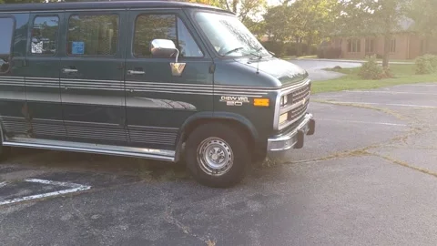 Green and Gray Chevy Van - Parking Lot Stock Footage 138180547