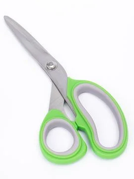 Green and gray handle scissors Stock Photos