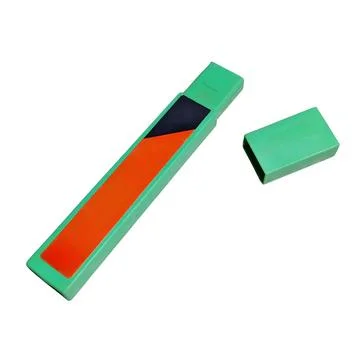 Green and Orange Rectangular Plastic Storage Container with Removable Cap 写真素材