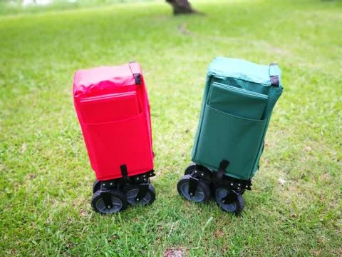 A green and red Cart for using in camping ltravel Stock Photos