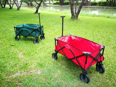 A green and red Cart for using in camping ltravel Stock Photos