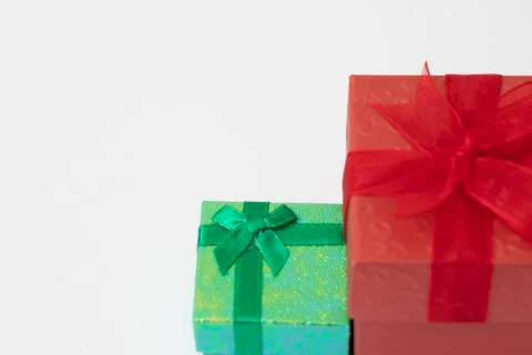 Green and Red Gift Box with Ribbon and Bow on the White Background, Stock Photos