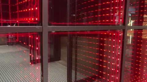 Green and Red LED Light Glass Grid Wall with Futuristic Glow Stock Footage 331551705