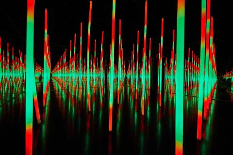 Green and red LED lights in infinity mirror room Stock Photos
