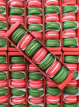 Green and red Macarons in box Stock Photos