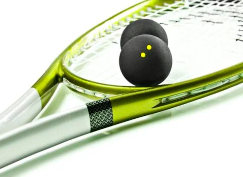 Green and silver squash racket and balls Stock Photos