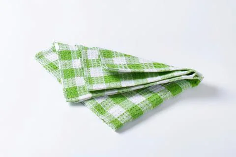 Green and white checkered folded cloth Foto stock