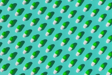 Green and white pills pattern on a green background. 3d illustration. 스톡 일러스트