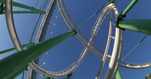 Green and White Roller Coaster Loop 1 Devin Olson Stock Footage 87192365