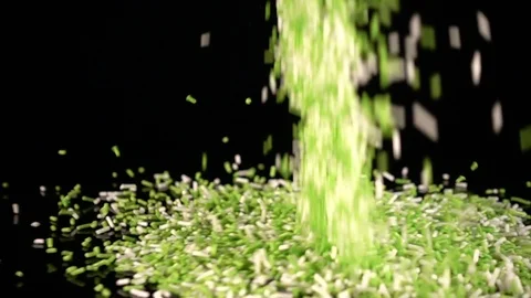 Green and White Sprinkles falling in slow motion. 库存影片 88615671