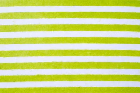 Green and white striped pattern on mulberry paper textured background, detail Stock Photos
