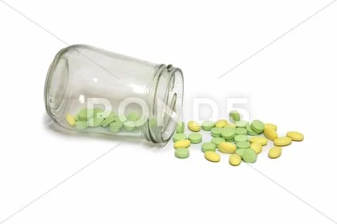 Green and yellow pills medicine Stock Photos