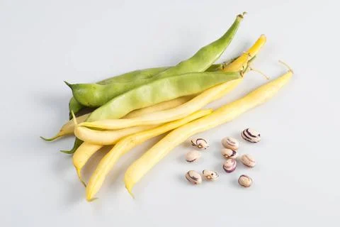 Green and yellow string beans green and yellow string beans over white bac... Stock Photos