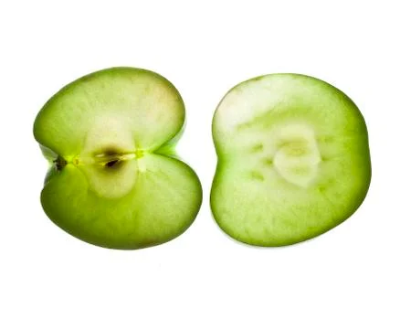 Green apple in backlight Stock Photos