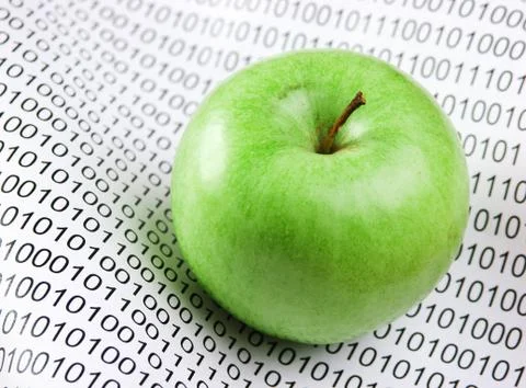 Green apple on a binary code Stock Photos