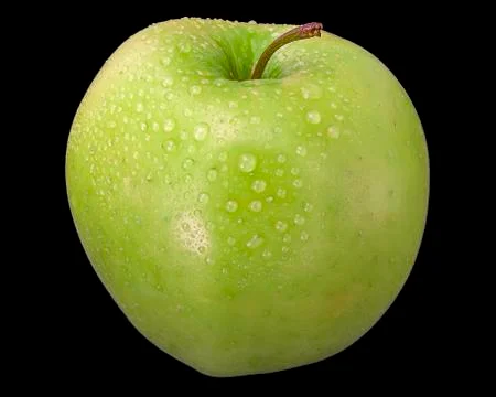 Green Apple on Black Background Stock Photos