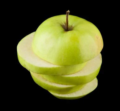 Green apple on a black background Stock Photos