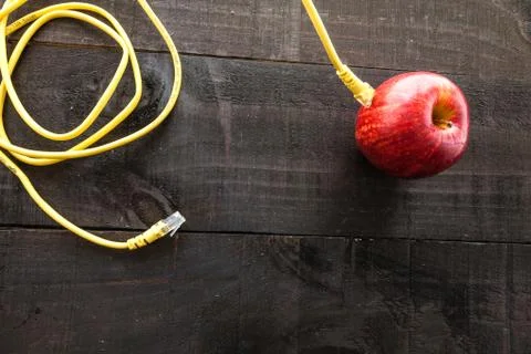 Green apple connected to a data network Stock Photos