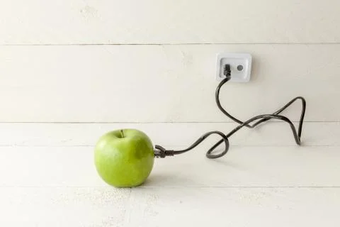 Green apple connected to a data network Stock Photos