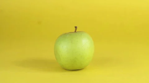 Green Apple Cut into Two with a Knife Stock Footage 57833230