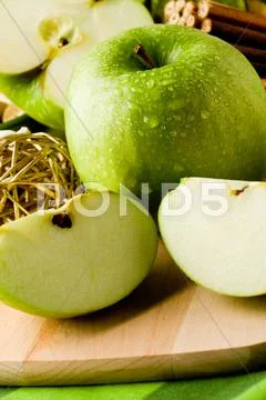 Green apple dessert on cutting board Stock Photos