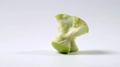 Green Apple Disappearing Bite by Bite Stop Motion White Background Stock Footage 331826847