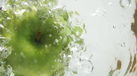 Green Apple Drop Down In Water Stock Footage 62956536