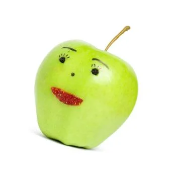 Green apple with face Stock Photos
