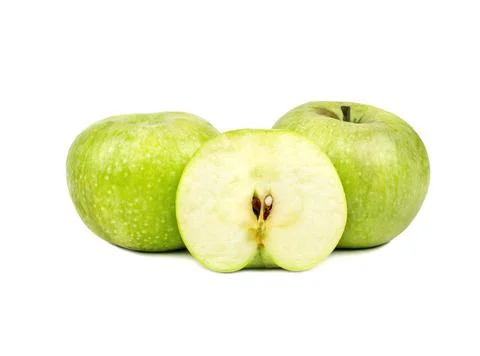 Green apple with half Stock Photos