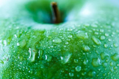 Green apple, macro. Stock Photos