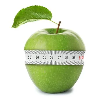 Green apple with measuring tape on white background. Slimming, weight loss co Stock Photos