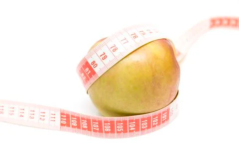 Green apple with a meter Stock Photos