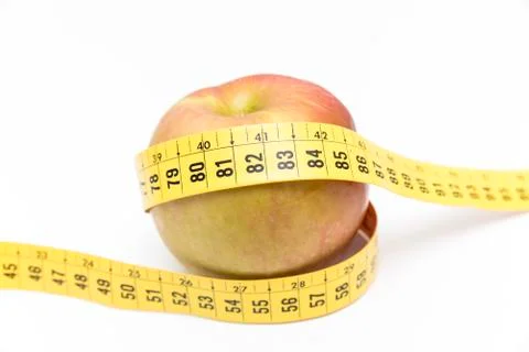 Green apple with a meter Stock Photos