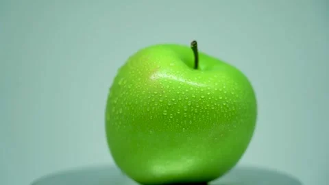 Green Apple or Granny Smith Apple droplets with water Video stock 296487266