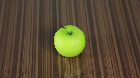 Green apple, a piece bitten off 스톡 동영상 61439610