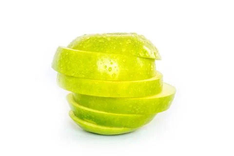Green apple slice on white background Stock Photos
