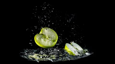 Green Apple Split Underwater Stock Photos