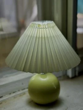 Green Apple Table Lamp by Window Stock Photos