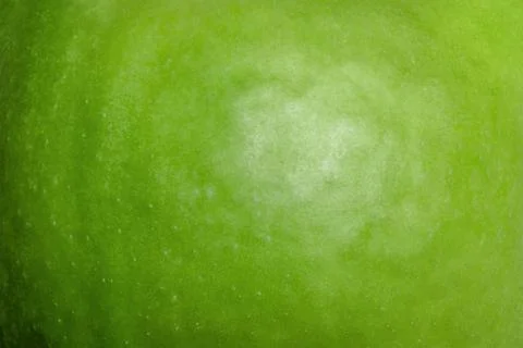 Green apple texture as a background macro photo. Foto stock