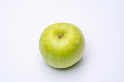Green apple with white background close up Stock Photos