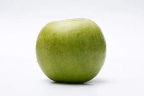 Green apple with white background close up Stock Photos