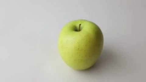 Green apple on white background Stock Footage 145536061