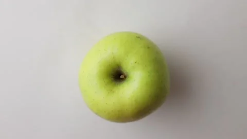 Green apple on white background Stock Footage 145536114
