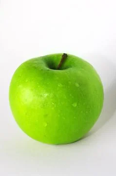 Green apple on white background Stock Photos