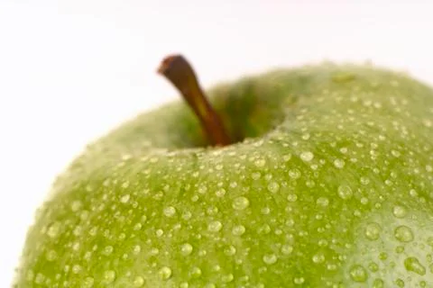Green apple on a white background Stock Photos