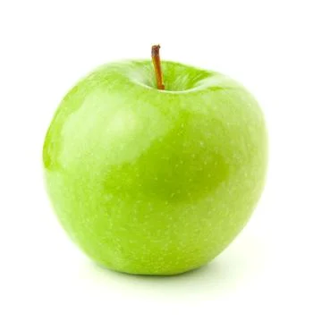 Green apple on a white background with a shadow. Stock Photos