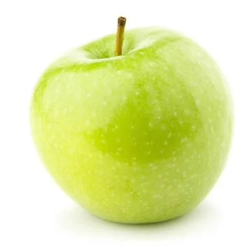 Green apple on a white background with a shadow. Stock Photos