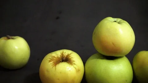 Green apples on a black background. fruit on black background. Stock Footage 99400967